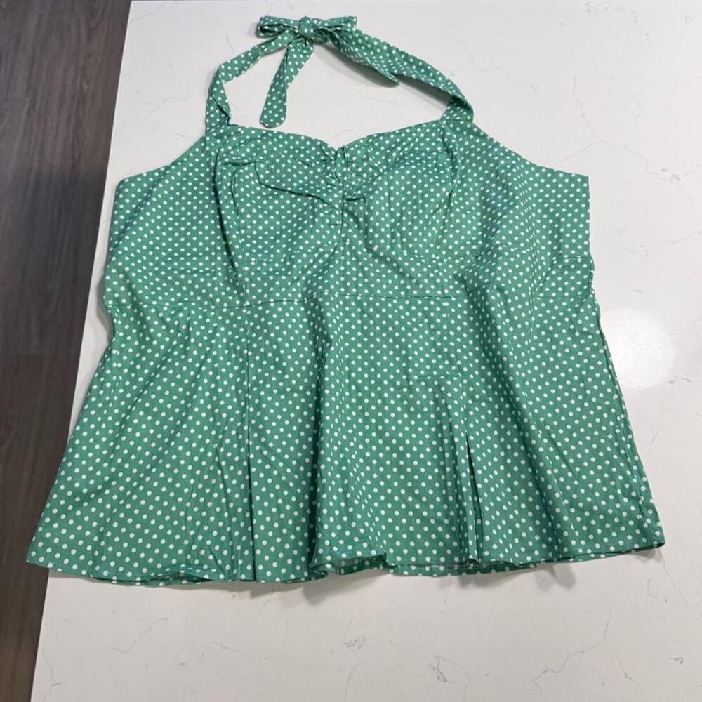 Green and white polka dot top